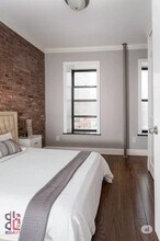 314 E 106th St in New York, NY - Foto de edificio - Building Photo