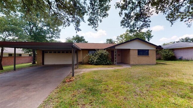 property at 1616 George Bush Dr