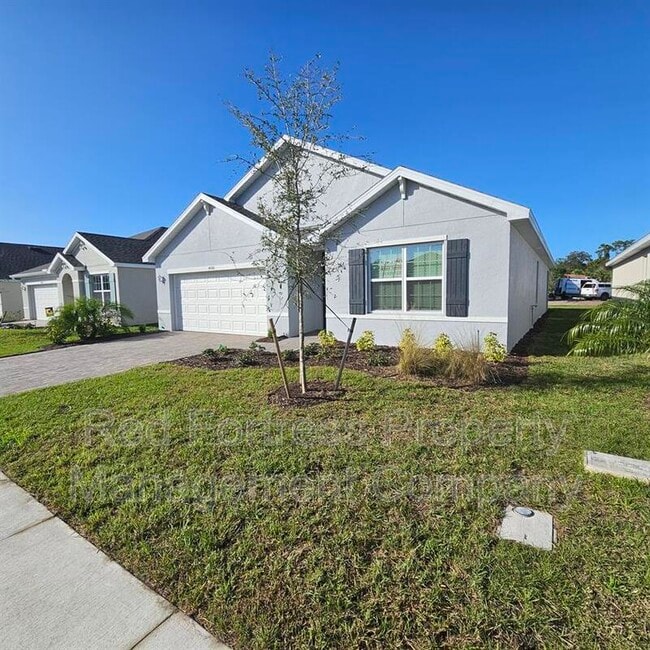 4080 Peaceful River Ln in Ft. Myers, FL - Foto de edificio - Building Photo