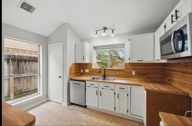 property at 14403 Wandering Wood Dr
