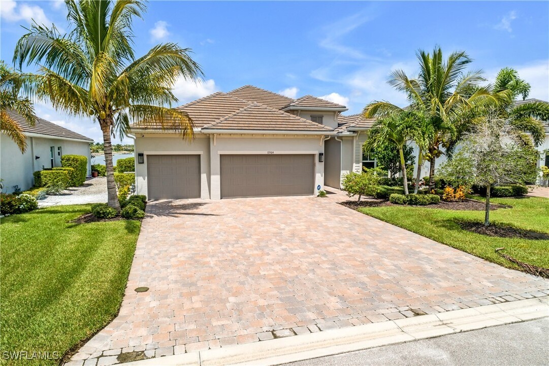 13504 Blue Bay Cir in Miromar Lakes, FL - Building Photo