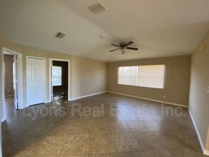 1127 Gilbert Ave S in Lehigh Acres, FL - Building Photo - Building Photo