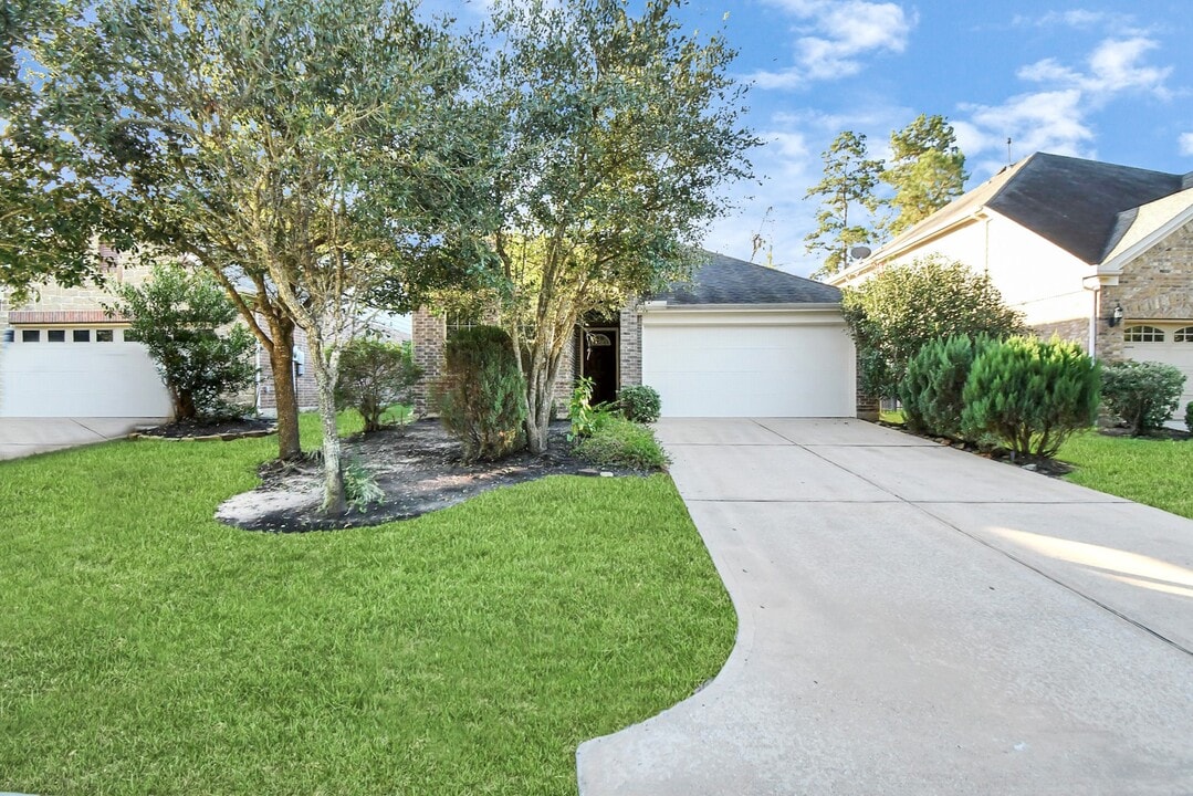 7 Tidwilow Pl in Tomball, TX - Building Photo