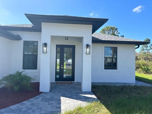12547 Trinity Ave in Port Charlotte, FL - Building Photo - Building Photo