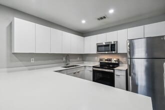 Junius Place Apartments in Dallas, TX - Foto de edificio - Building Photo