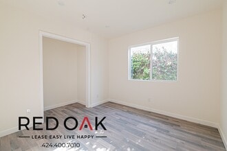 1028 W 110th St in Los Angeles, CA - Building Photo - Building Photo