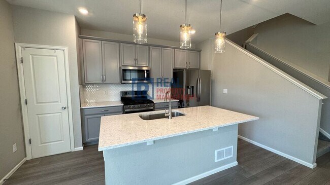 21371 E 60th Ave in Aurora, CO - Building Photo - Building Photo
