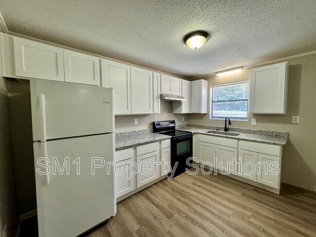property at 1716 Green Oaks Dr SE