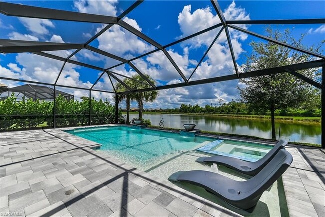 7763 Winding Cypress Dr, Unit 802 in Naples, FL - Foto de edificio - Building Photo