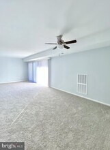 7700 Arehart Dr-Unit -1211 in New Carrollton, MD - Building Photo - Building Photo