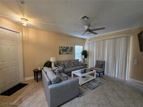 1335 Sweetwater Cove in Naples, FL - Building Photo - Building Photo