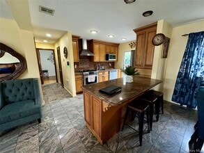 1316 Mcclure Ave in Elmont, NY - Building Photo - Building Photo