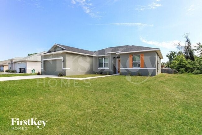 1644 Tench Ct in Poinciana, FL - Building Photo - Building Photo