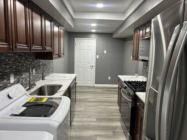 10246 Prince Pl, Unit 108 in Largo, MD - Building Photo - Building Photo