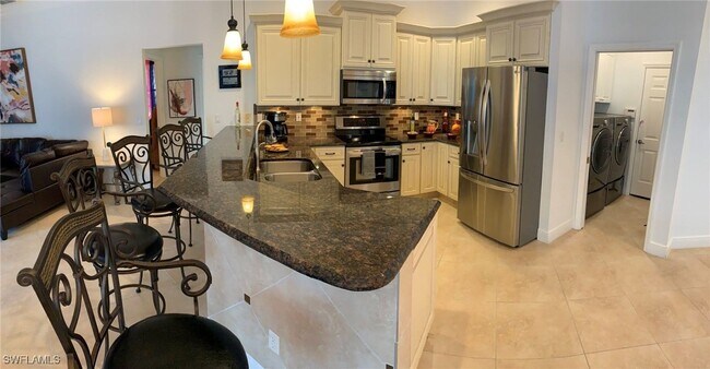 property at 8906 Lely Island Cir