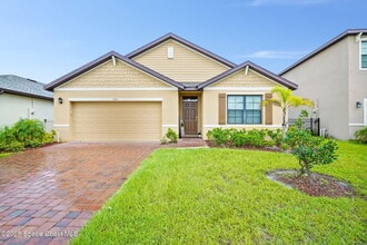 1954 Farmhouse Rd SE in Palm Bay, FL - Building Photo - Building Photo