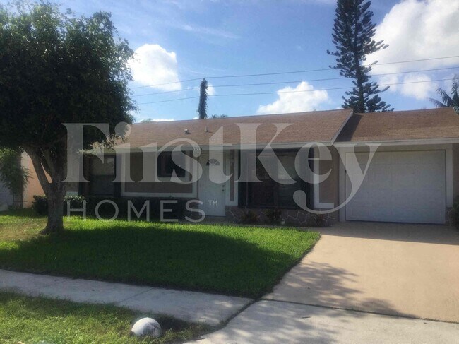 5896 Triphammer Rd in Greenacres, FL - Building Photo - Building Photo