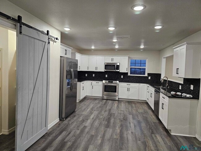 1812 Jonquil Park Dr in Clovis, NM - Building Photo - Building Photo