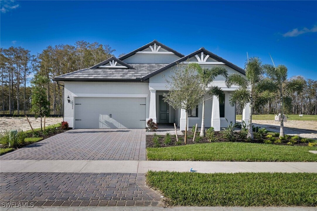 19292 Aqua Shore Dr in Miromar Lakes, FL - Building Photo