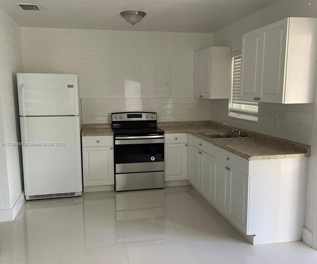 property at 320 NW 83rd St
