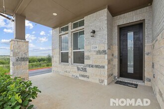 13206 Dairywork Rd in Mustang Ridge, TX - Building Photo - Building Photo