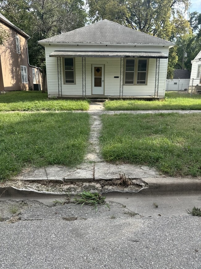 property at 223 W 1st St