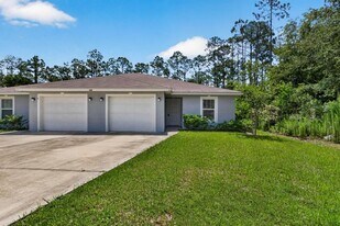 129 Wellwood Ln, Unit Unit B in Palm Coast, FL - Building Photo