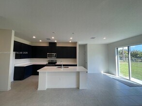 2133 SE Flanders Rd in Port St. Lucie, FL - Building Photo - Building Photo