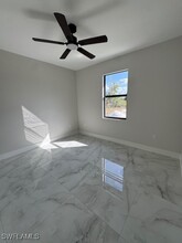 2401 Millie Ave S in Lehigh Acres, FL - Building Photo - Building Photo