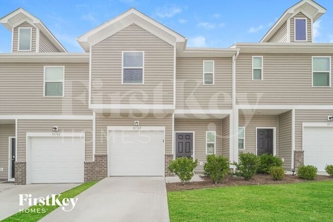 property at 10740 Rivergate Dr NW