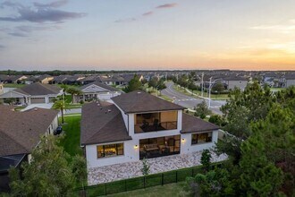 7876 Roma Dune Dr in Wesley Chapel, FL - Foto de edificio - Building Photo
