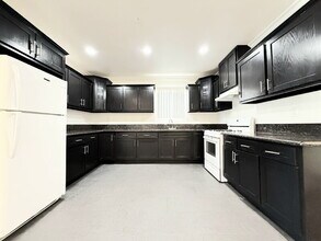 114 W 50th St in Los Angeles, CA - Building Photo - Building Photo