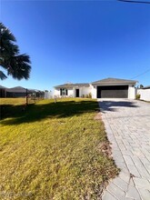 1107 NE 44th Ln in Cape Coral, FL - Building Photo - Building Photo