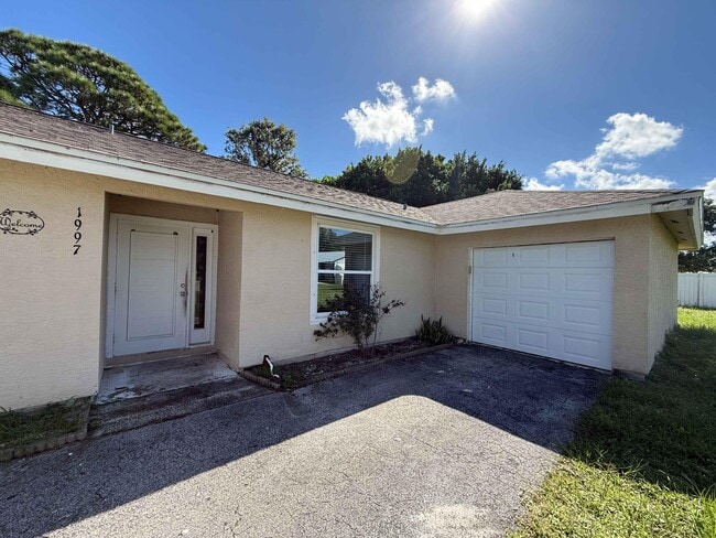 property at 1997 SE Burgundy Ln