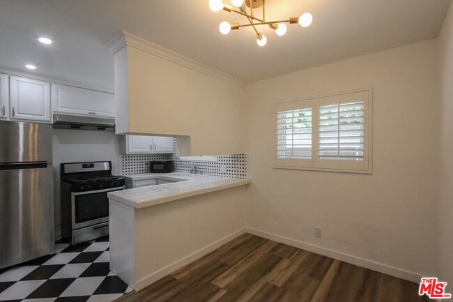 property at 12942 Moorpark St