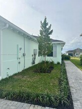 1443 Tangled Orchard Tr in Loxahatchee, FL - Building Photo - Building Photo