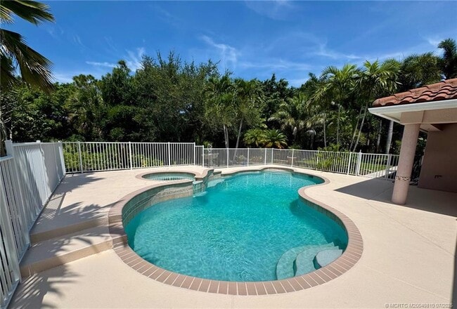 property at 4881 SW Lake Grove Cir