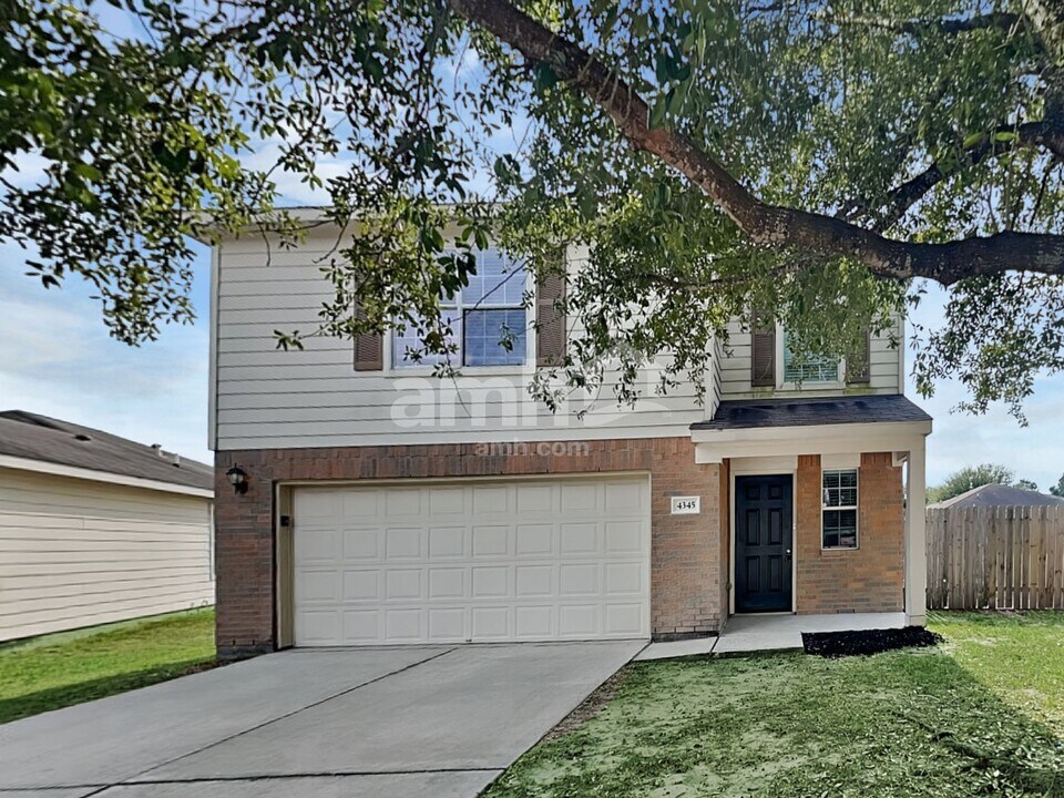 4345 Medina River Loop in Spring, TX - Building Photo