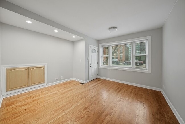 1548 N Honore St, Unit 1F in Chicago, IL - Foto de edificio - Building Photo