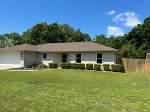 7360 Calle Ln in Navarre, FL - Building Photo - Building Photo