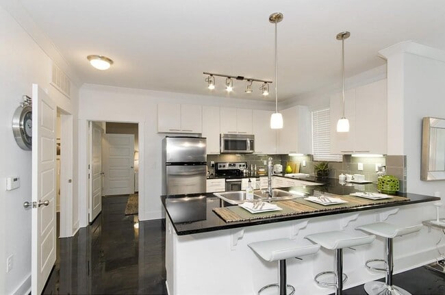 1100 W Trinity Mills Rd