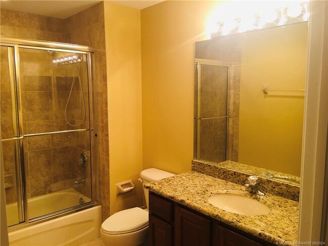 property at 3582 SW Sawgrass Villas Dr