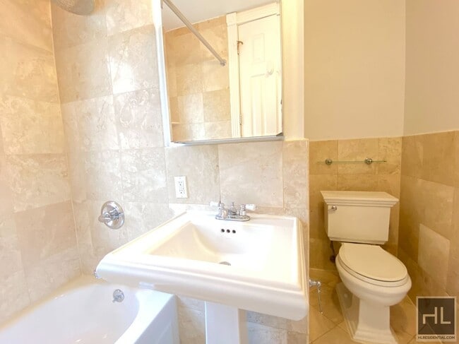 Perry Street in New York, NY - Building Photo - Building Photo