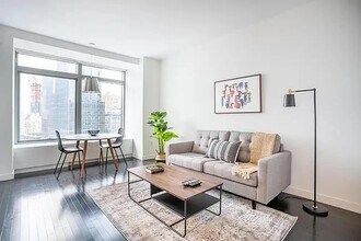 123 Washington St, Unit D40 in New York, NY - Building Photo - Building Photo