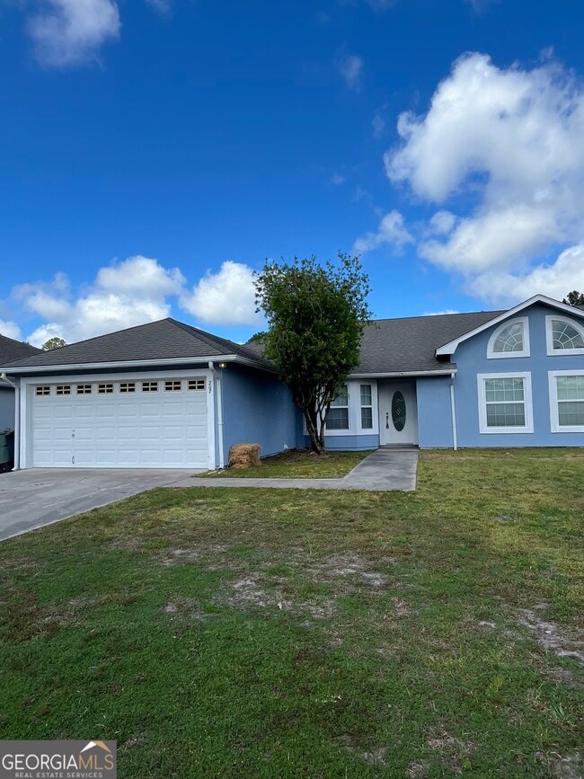 property at 207 Royal Palms Ave