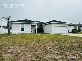 305 Hibiscus Dr in Poinciana, FL - Building Photo