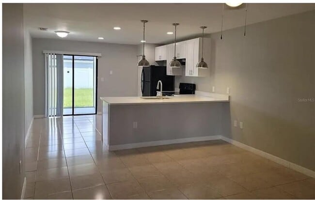 781 Squirrel Ct in Poinciana, FL - Building Photo - Building Photo