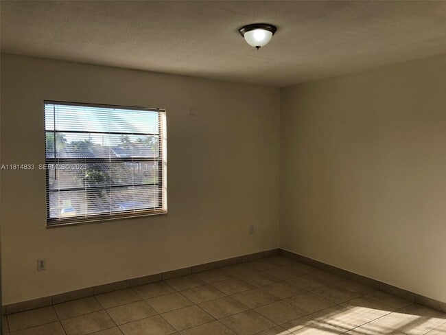 property at 8701 SW 12th St