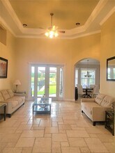 12625 Sweet Hill Rd in Polk City, FL - Foto de edificio - Building Photo