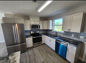 1249 Chobee St in Okeechobee, FL - Building Photo - Building Photo